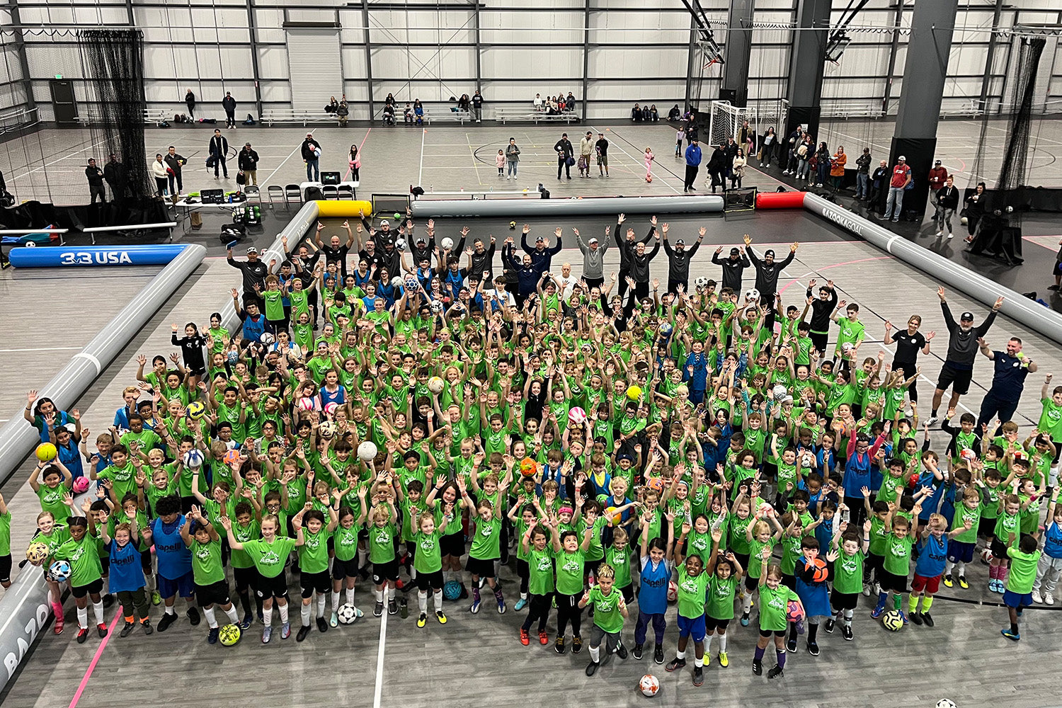 Young Football Players inside the AirPitch Inflatable Football Pitch in a USA Tournament