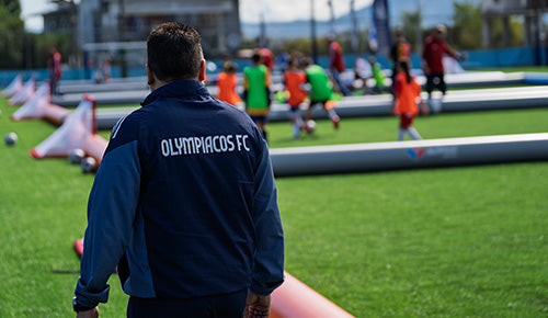 olympiacos fc airpitch 3v3 inflatable football pitch blow up soccer field for youth training and tournaments